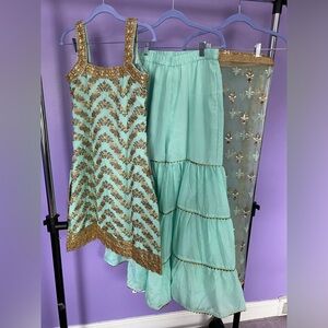 Light blue green gharara suit with gold. Indian wear.